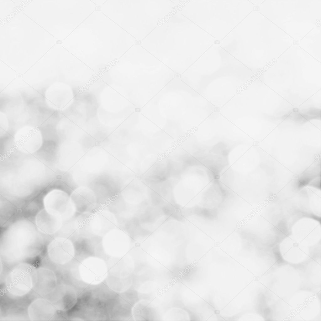 Dekorative Silber Weihnachten. Grauer Hintergrund mit Bokeh-Leuchten
