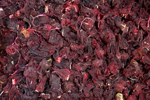 Té rojo seco Hibiscus Textura de fondo extrema primer plano — Foto de Stock