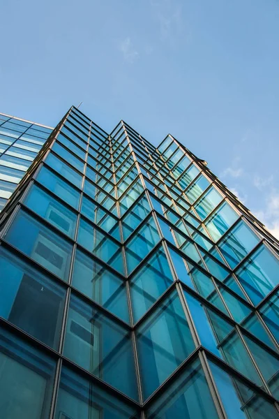 Square windows of modern steel and glass office building rising — Stock Photo, Image