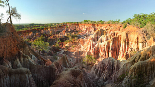 Marafa Depression (Hell's Kitchen canyon) with red cliffs