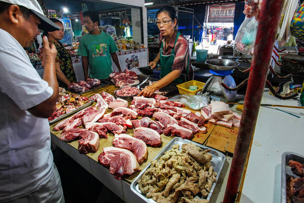 Khao Lak, Thailand - February 22, 2016:  Unknown man buying fres