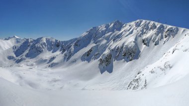 Düşük Tatras Panoraması ile Mount Chopok tepe üzerinde güneşli bir kış 