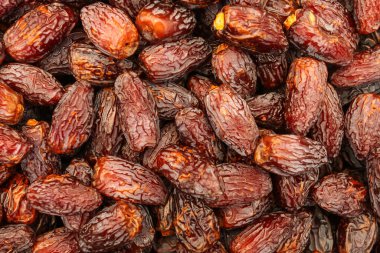 Gıda pazarında gösterilen tarihler (hurma ağaçları).