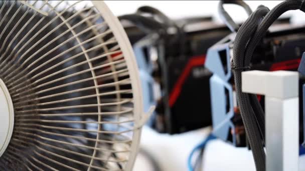 Cryptocurrency Mining Rig Being Cooled Old Dusty Fan Blurred Video — Stockvideo