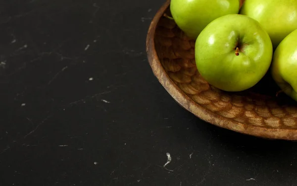 Green Apples Wooden Carved Bowl Only Part Visible Black Board — Stock Photo, Image