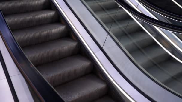 Two Escalators Rows Going Both Ways Person Walks — Stock Video