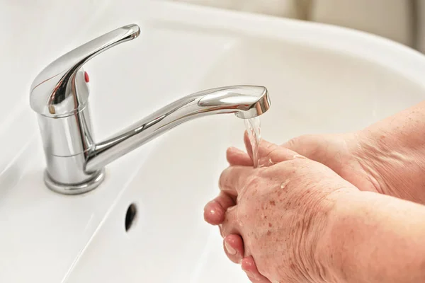Elderly Woman Washing Her Hands Soap Tap Water Faucet Can — Stock Photo, Image