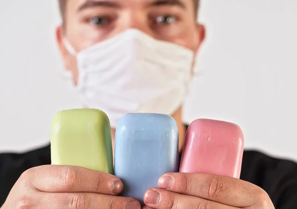 Young Man Face Virus Nose Mouth Mask Holding Colourful Soap — Stock Photo, Image