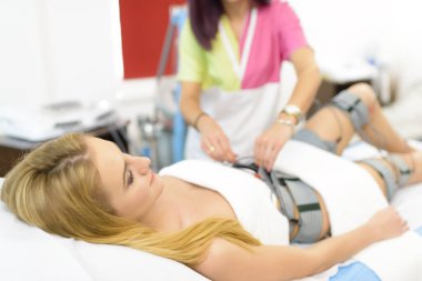 Beautiful Woman getting Electrostimulation Therapy