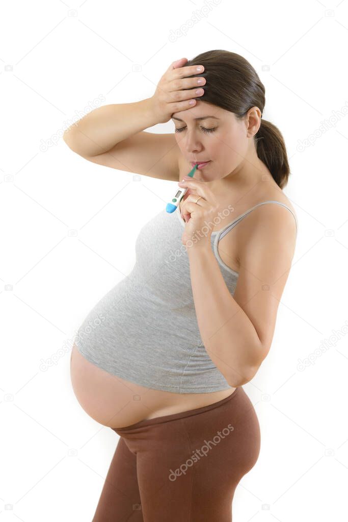 Pregnant Woman using Digital Thermometer