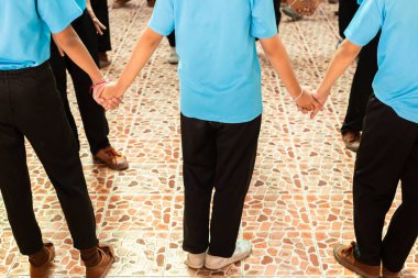 Çocuklar el ele tutuşur. Konsept Ekip Çalışması, koruma.