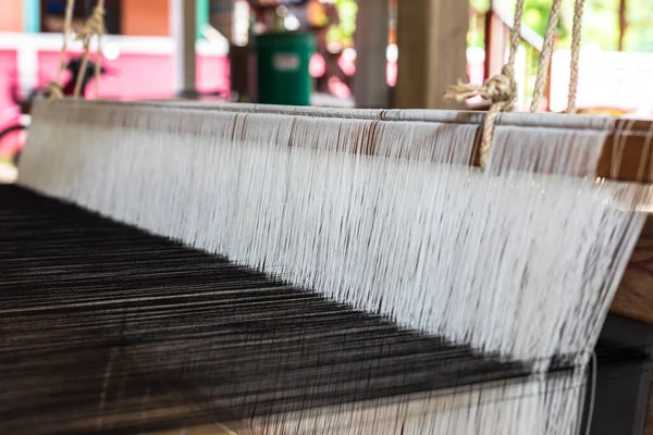 the manual wood loom for make cloth, carpet or fablic.