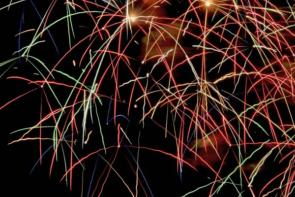 Celebration beautiful colorful fireworks. Holidays salute of various colors on night sky. — Stock Photo, Image
