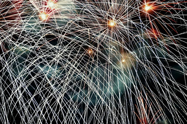 Celebration beautiful colorful fireworks. Holidays salute of various colors on night sky. — Stock Photo, Image