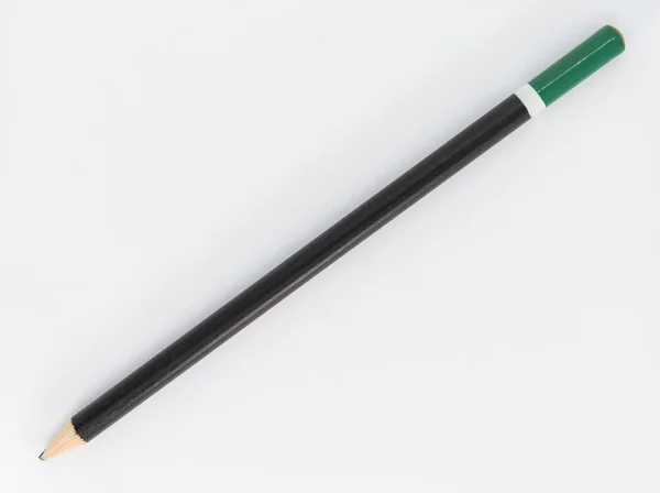 Green and black pencil — Stock Photo, Image