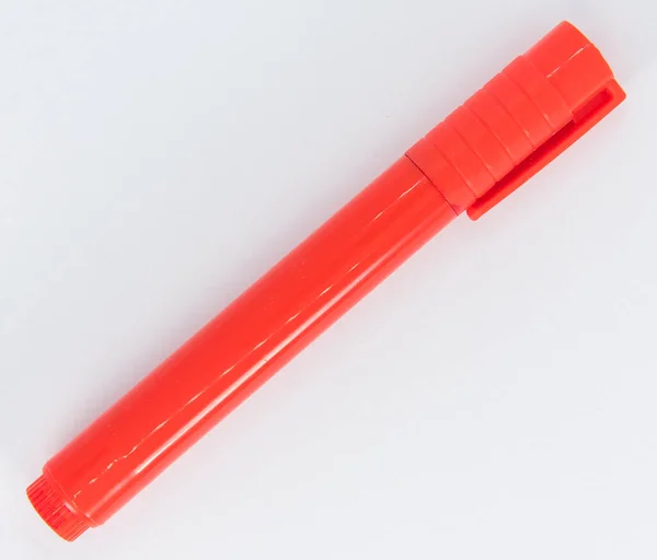 Czerwony długopis używany w szkole — Zdjęcie stockowe