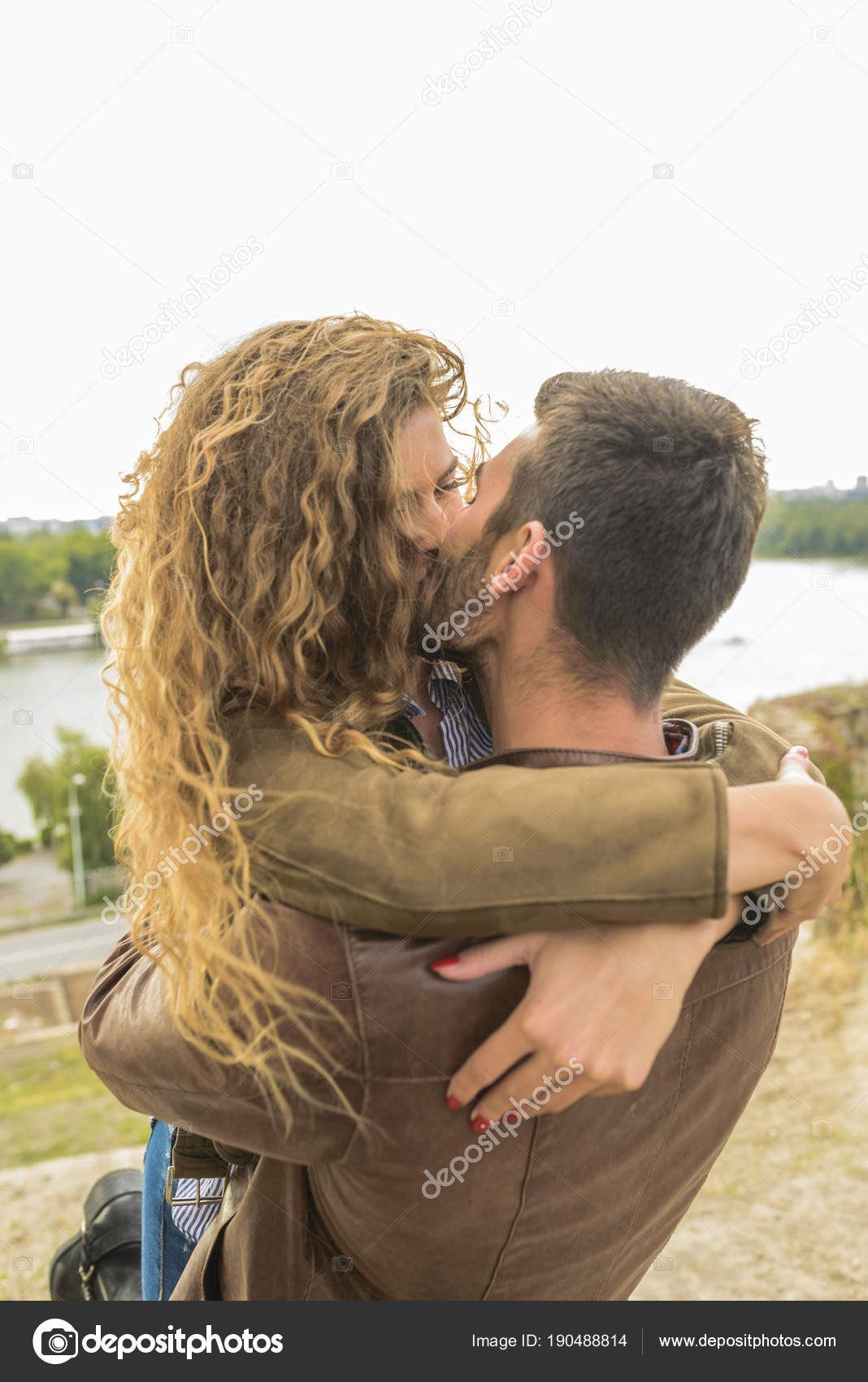 Young handsome couple enjoying the time Stock Photo by © 190488814 Young handsome couple enjoying the time Stock Photo by © 190488814