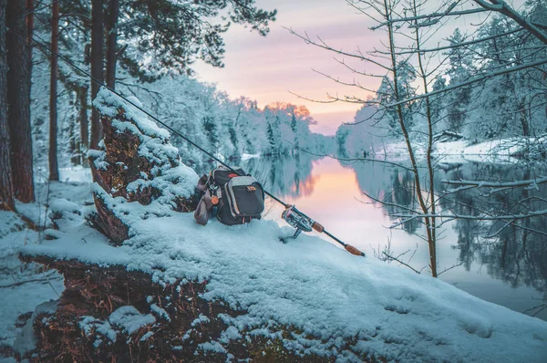 Fishing gear on the bank of a winter river — Stock Photo, Image