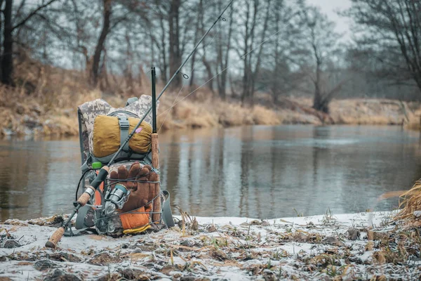 Fishing for autumn trout. Hiking with a backpack. — Stock Photo, Image