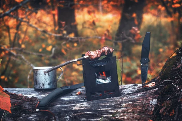 Bushcraft. Cooking and coffee in the autumn forest. — Stock Photo, Image