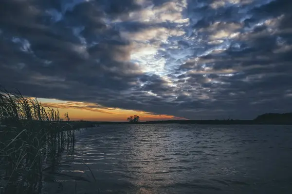 stock image Epic sunset on the lake.