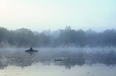 Fishing on the kayak. Fishing with spinning.