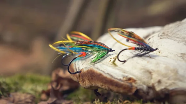 Fly fishing flies. Fishing on an artificial fly. — Stock Photo, Image