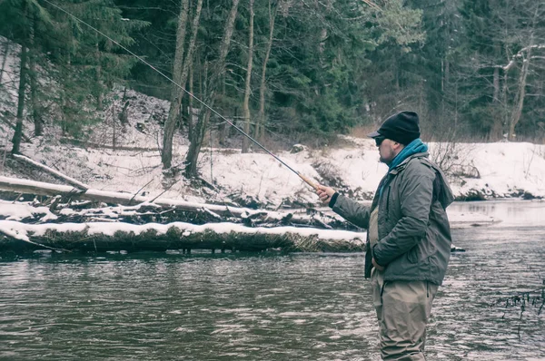 Fishermen on the winter river. Tenkar� Fishing. — Stock Photo, Image