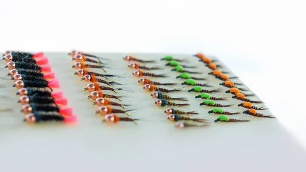 Flies for fly fishing. Fishing on an artificial fly. — Stok fotoğraf