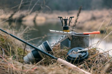 Cooking on a gas burner while camping.