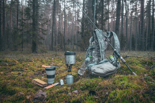 Cooking while hiking with a backpack. — 스톡 사진