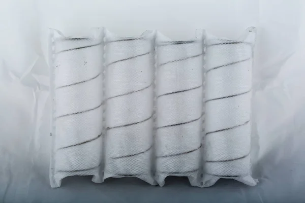Independent mattress springs in spunbond