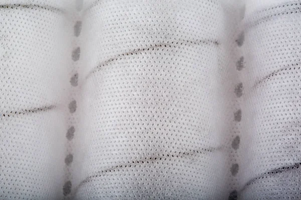 Independent mattress springs in spunbond