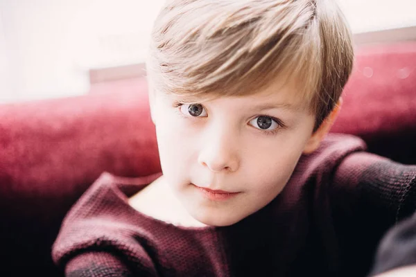 A closeup portrait of a cute kid boy with grey eyes — Stock Photo, Image