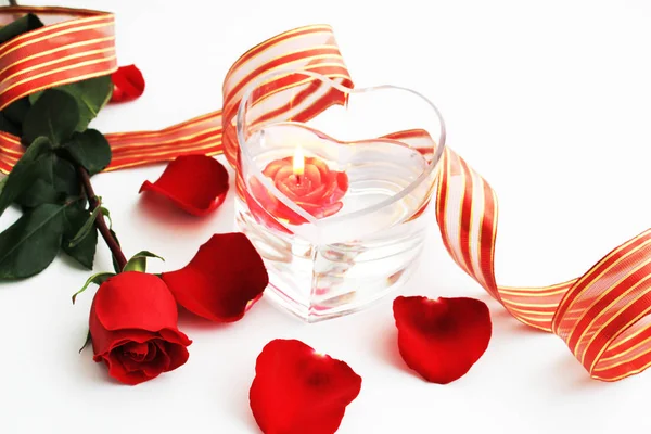 Composition with red rose and red candle — Stock Photo, Image