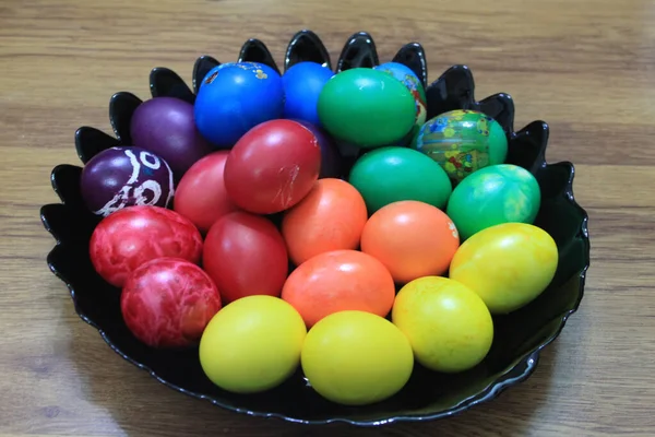 Colorful Easter Eggs Placed Black Plate Wooden Background Royalty Free Stock Photos