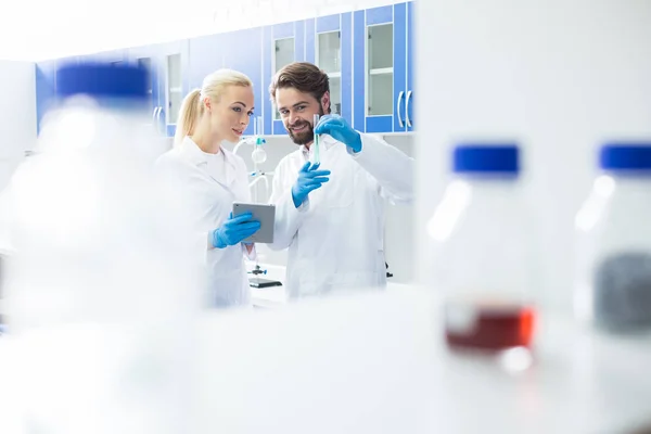 Cheerful positive scientists standing together — Stock Photo, Image