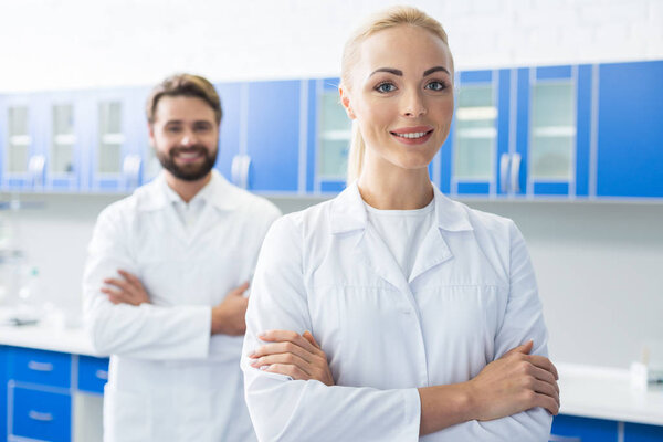 Positive female scientist enjoying her job