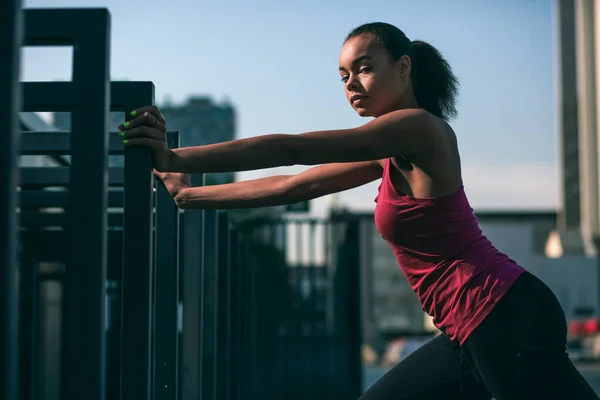 Beautiful Fit Woman Outdoors Hands Banister Looking Serious — Stock Photo, Image