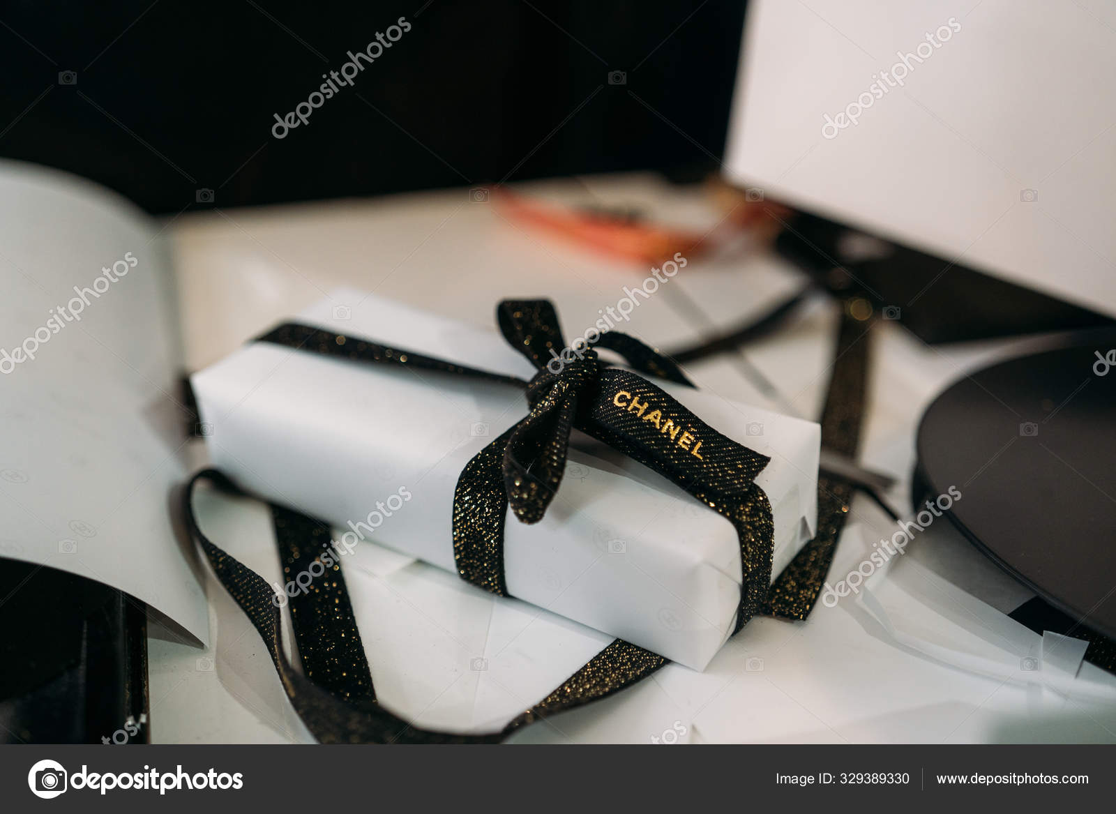 New York City, USA - January 02, 2020: Beautiful luxury Chanel gift with  proper packaging showing the brand on the ribbon. Perfect for Valentine day  or christmas. – Stock Editorial Photo © manupadilla #329389330