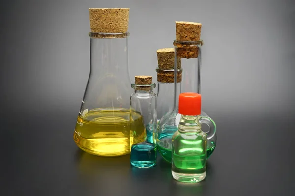 Surtido de soluciones coloridas o aceites esenciales —  Fotos de Stock