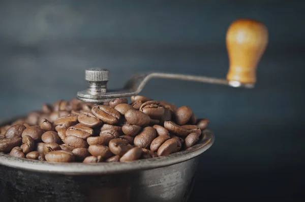 Coffee beans in a coffee grinder — Stock Photo, Image