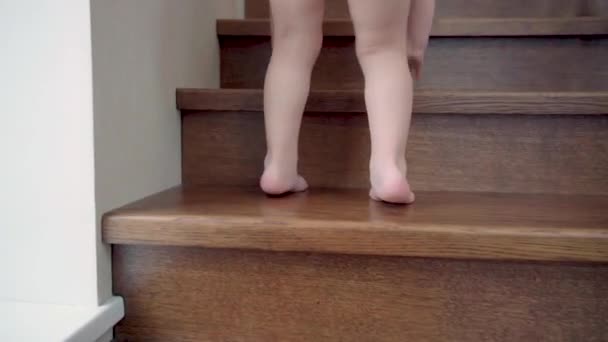 Close Child Bare Feet Quickly Climb Wooden Staircase Wrought Iron — Stock Video