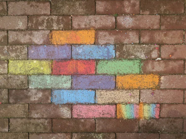 sidewalk colored with drawing chalk