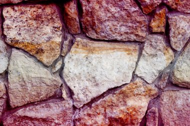 Doku, arka plan. Vahşi taş, granit, kum ile kaplı çit