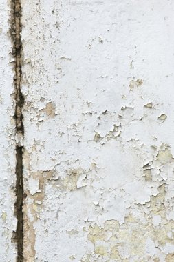 Doku, desen, arka plan. eski boya. Beton duvar boya, boya soyut beton arkasında kırık. Beyaz ses tonuyla boya zaman içinde flakes