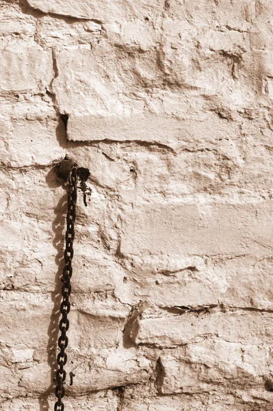 Textura, fundo. uma parede forrada com pedra, caiada de branco — Fotografia de Stock