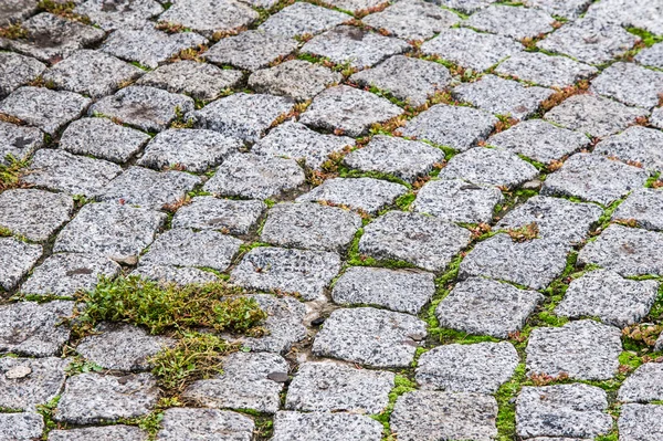 Texture, background. The pavement of granite stone. Paved roadwa — Stock Photo, Image