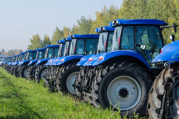 Russian Republic of Tatarstan. Plant for the assembly of agricultural machinery September 22, 2014 .tractor, agrimotor. a powerful motor vehicle with large rear wheels, used chiefly on farms for hauling equipment and trailers.