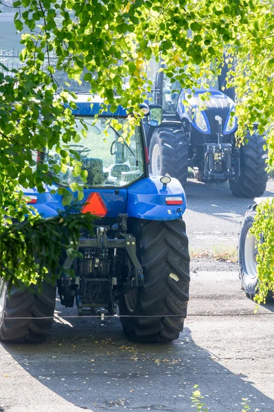 Russian Republic of Tatarstan. Plant for the assembly of agricultural machinery September 22, 2014 .tractor, agrimotor. a powerful motor vehicle with large rear wheels, used chiefly on farms for hauling equipment and trailers.